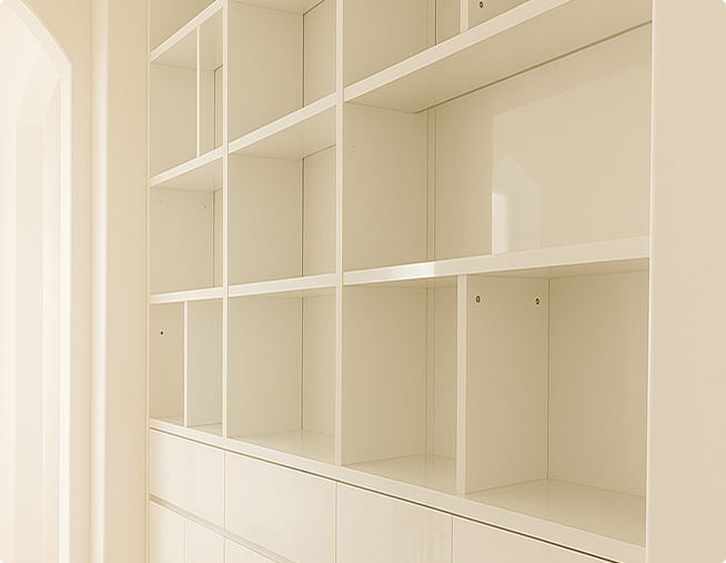 Open shelving system with white custom cabinetry in BraeWood project Dallas TX