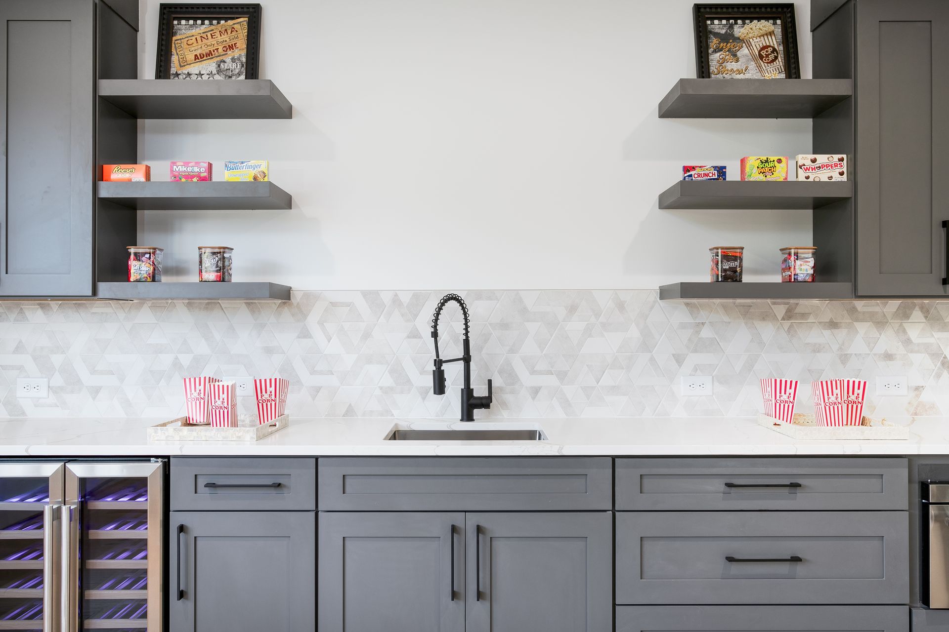 Custom gray cabinetry with open shelving and modern sink in the Strickland Heights Custom Cabinetry Project Summerfield NC