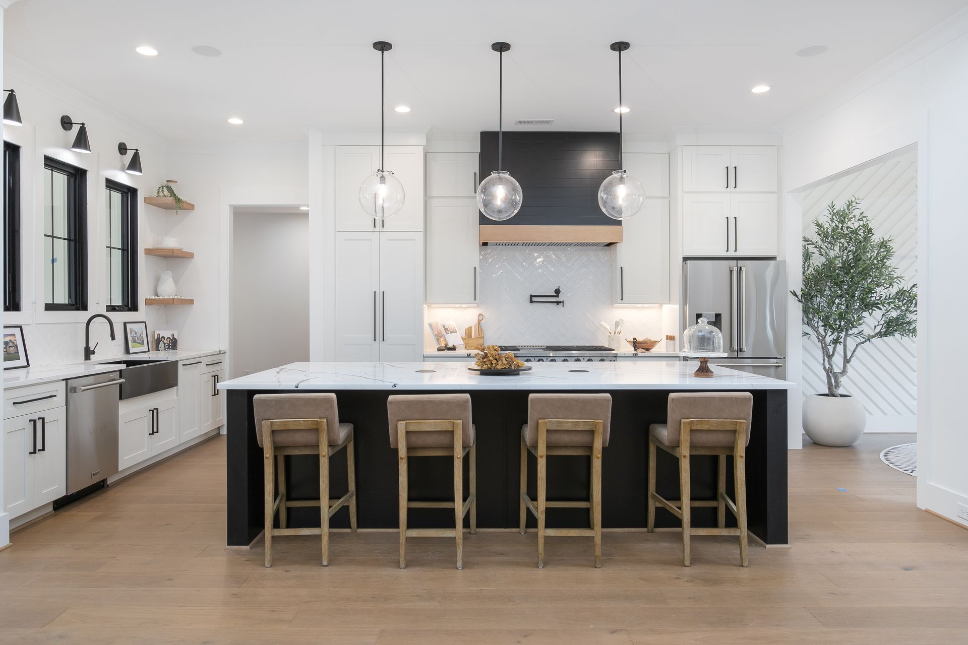 Spacious kitchen island with seating in The Hills Custom Cabinetry Project Summerfield NC
