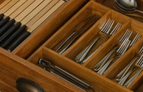 Cutlery and knife organizer duo in a neatly arranged kitchen drawer