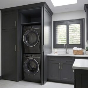 Washer & dryer pocket doors for concealed laundry storage