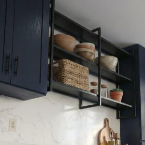 Open metal shelf providing accessible storage for kitchen items