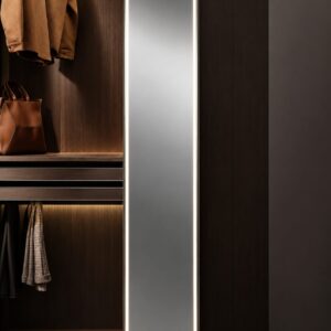 Full-length LED closet mirror integrated into a luxury dark wood custom wardrobe